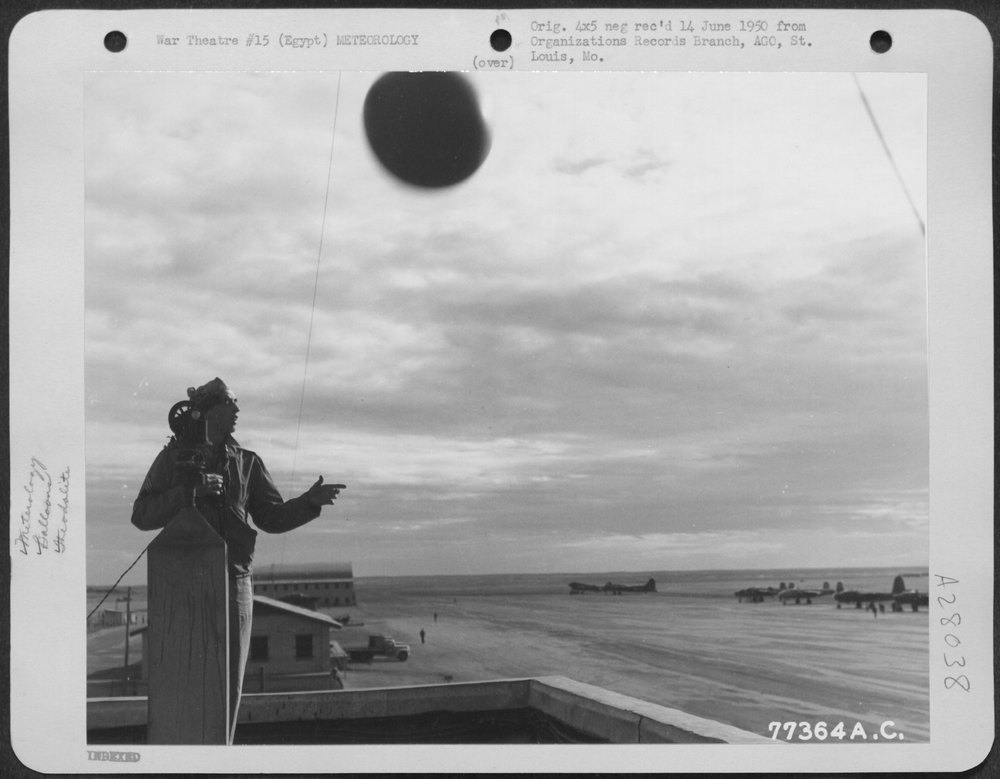 Enlisted man releases balloon at Payne Field