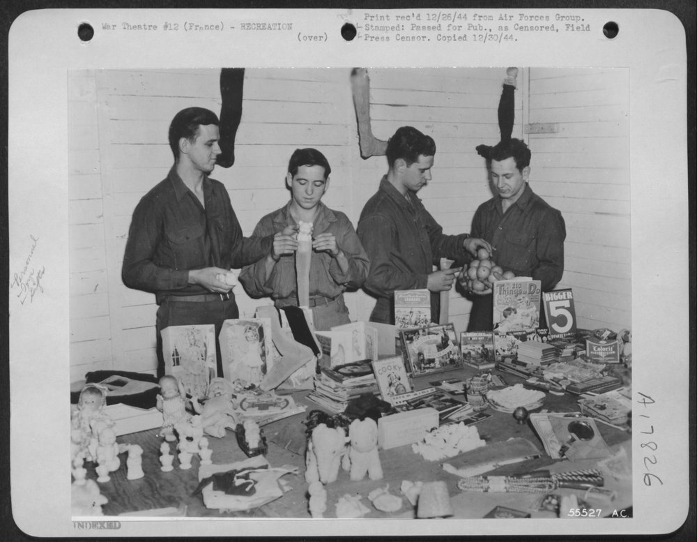 Filling Stockings for French Children's Christmas Are: Pvt. George