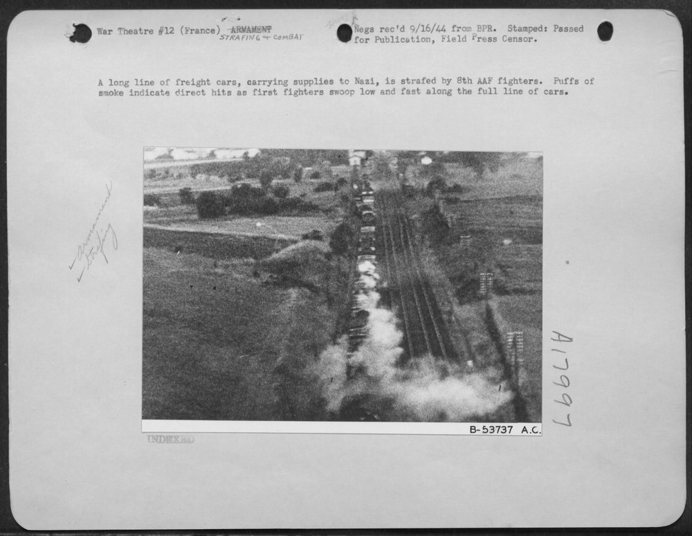 Freight cars strafed by 8th AAF fighters