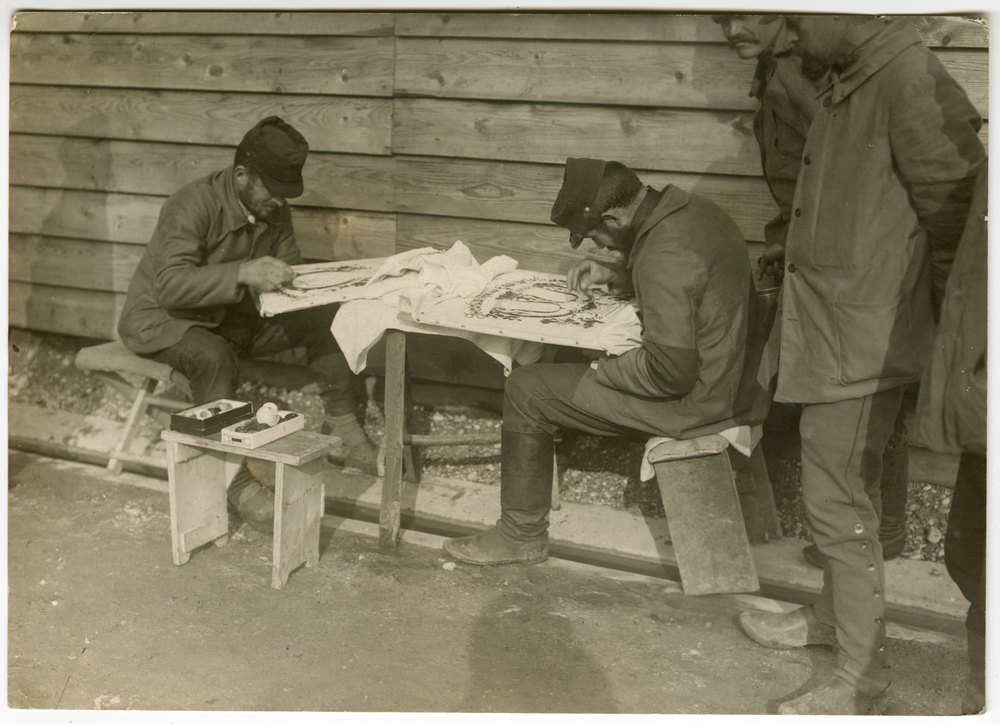 French prisoners doing embroidery
