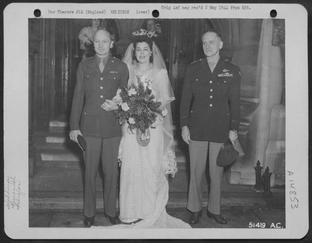 General Carl Spaatz poses in front of Holy Trinity Church in London