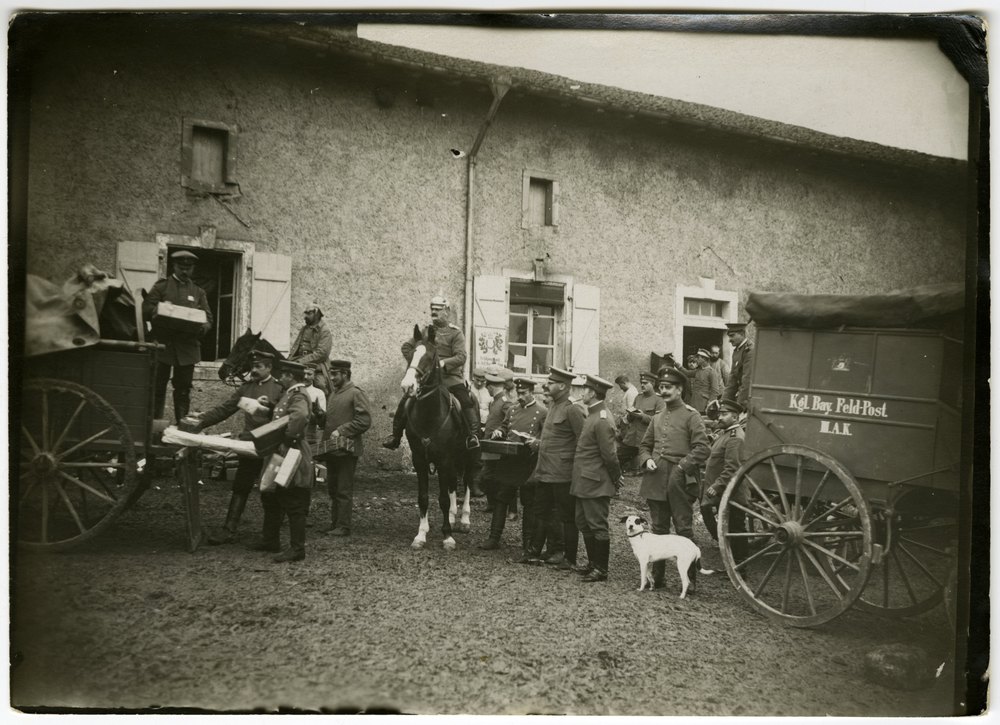 German military personnel with horse-drawn wagons