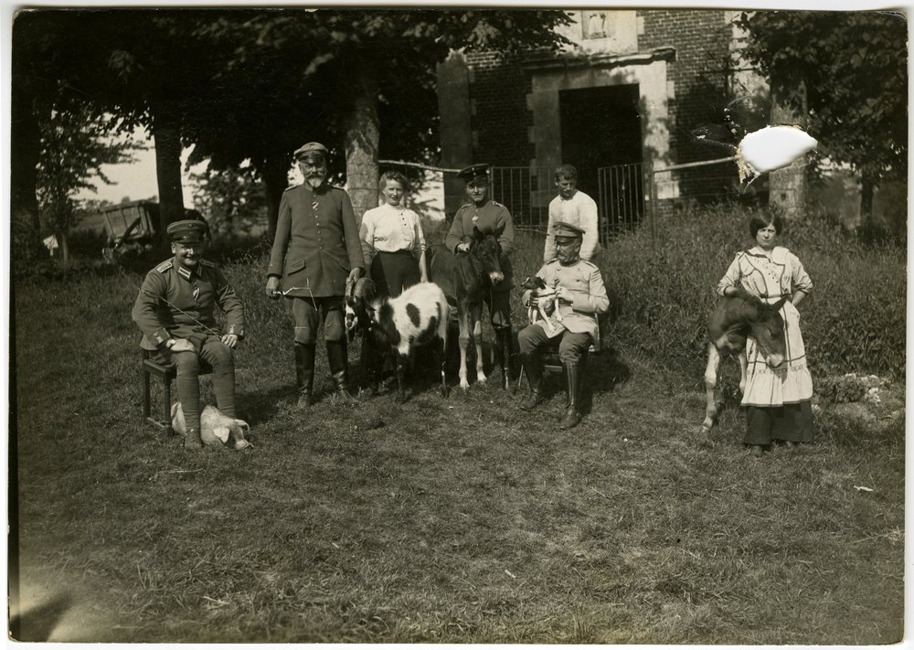 German soldiers with animals and women