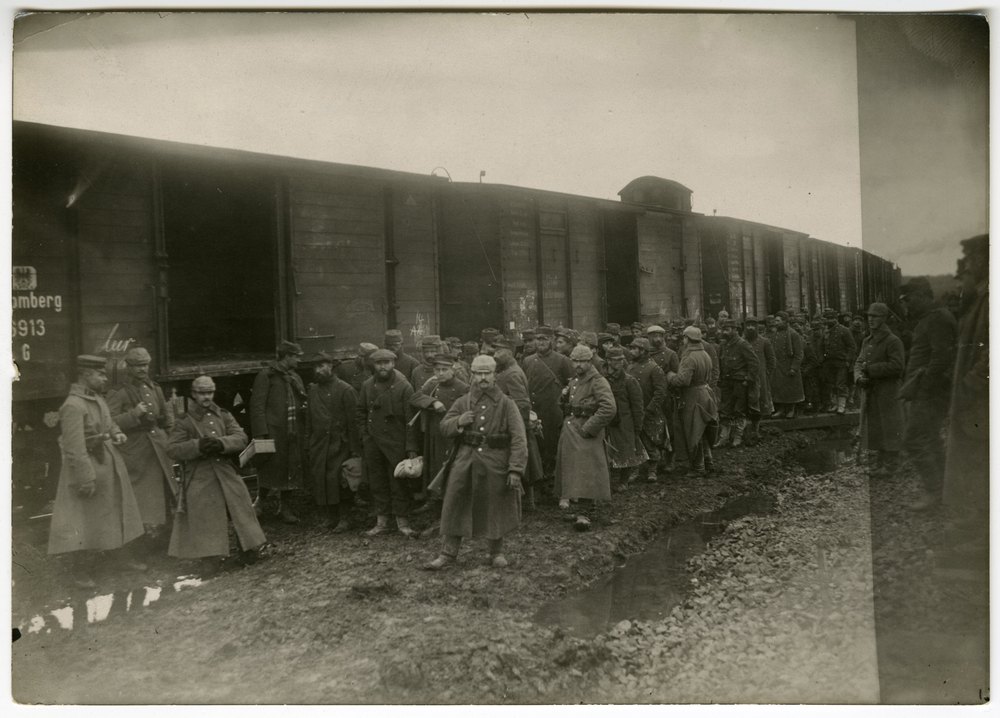 German soldiers with railway freight cars