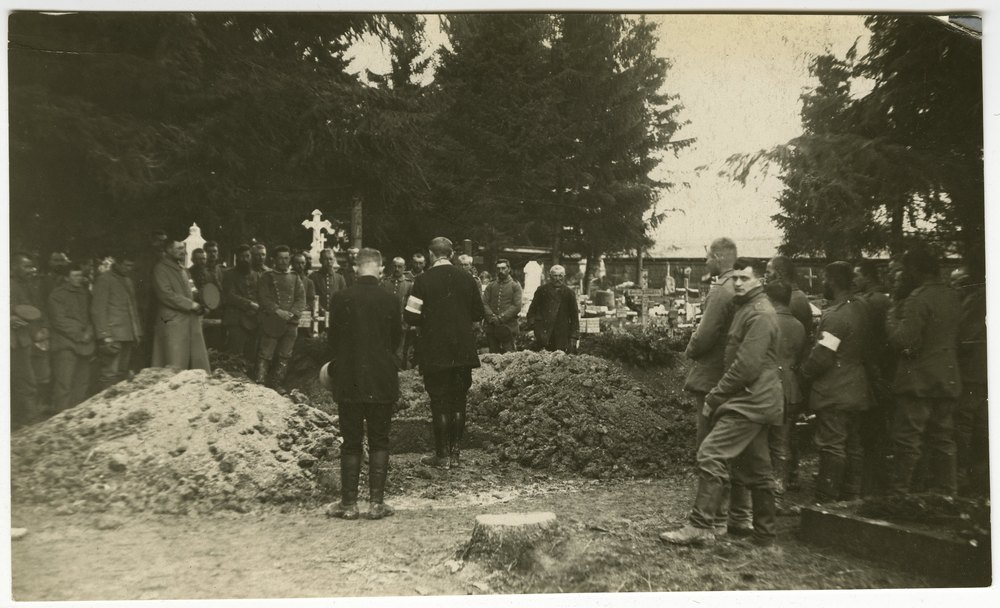 German troops at a funeral in a cemetery