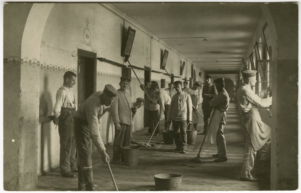 German troops cleaning a hallway