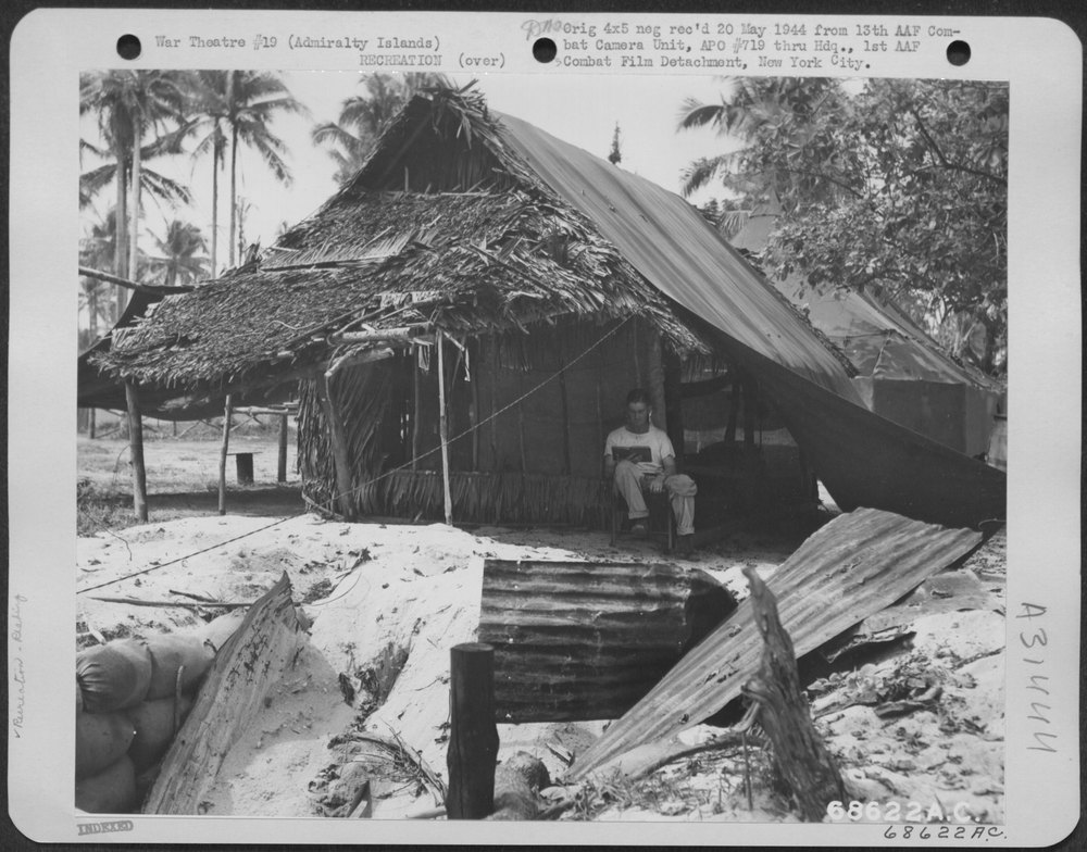 GI reads book Admiralty Islands