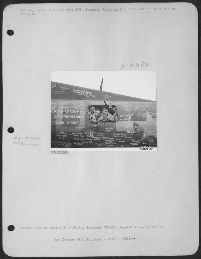 Ground crew of Boeing B-17 Flying ofrtress "Hell's Angels" in waist