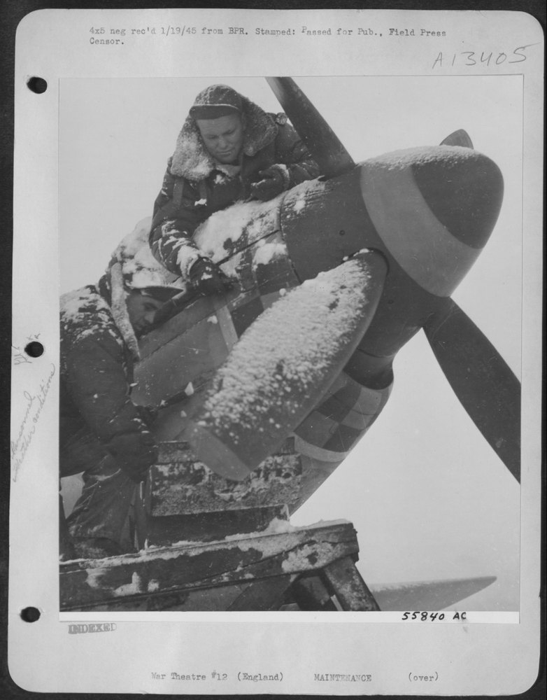 Ground Crewmen Carry on the Preliminary Fight with the Elements