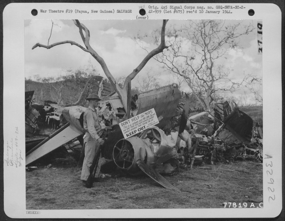 Guard at plane salvage yard Port Moresby