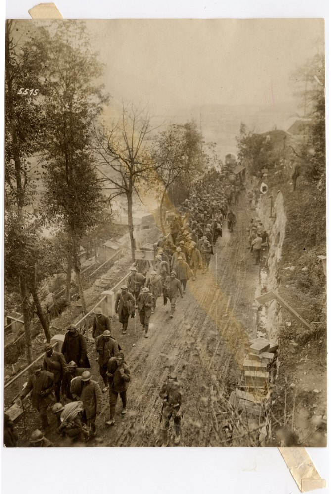 Italian prisoners transported on a dirt path