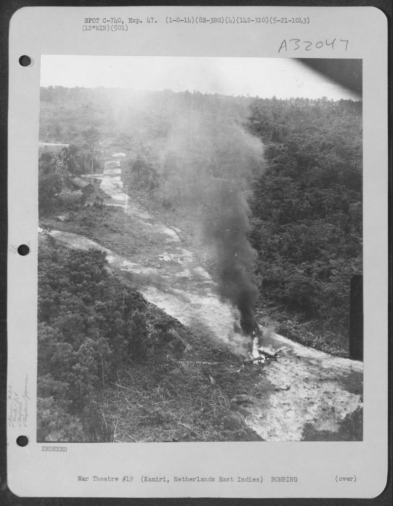 Japanese airplane burns at Kamiri