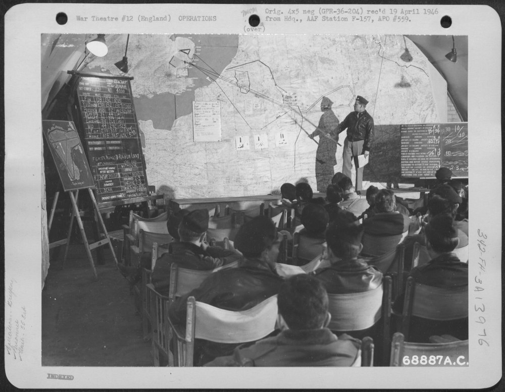 Lt Colonel Bailey briefs 353rd Fighter Group in England