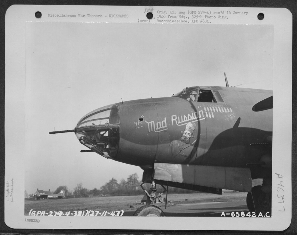 Lt Gude and crew with B26 in England