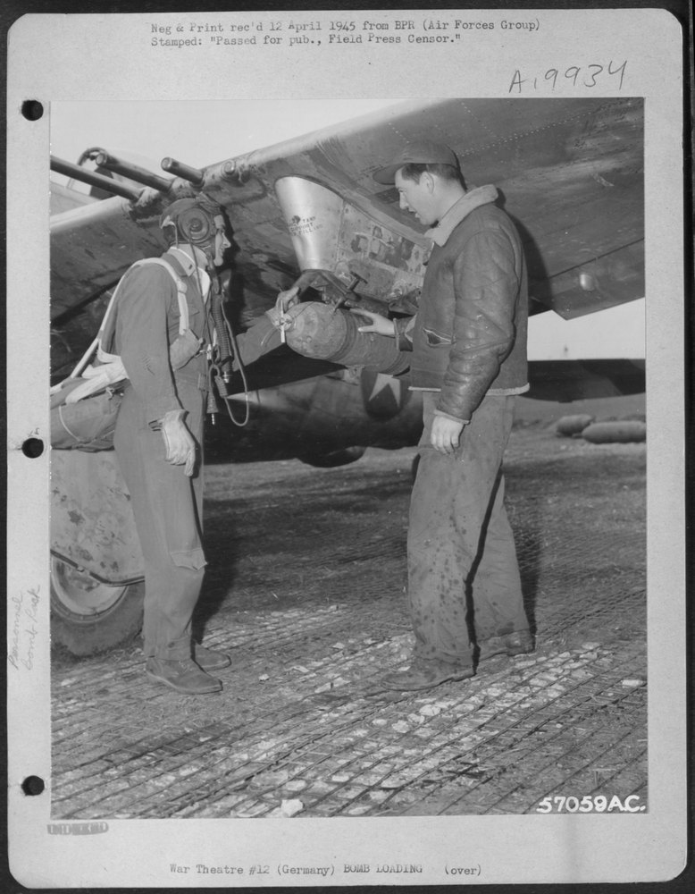 Lt Richey checks P-47 in Germany