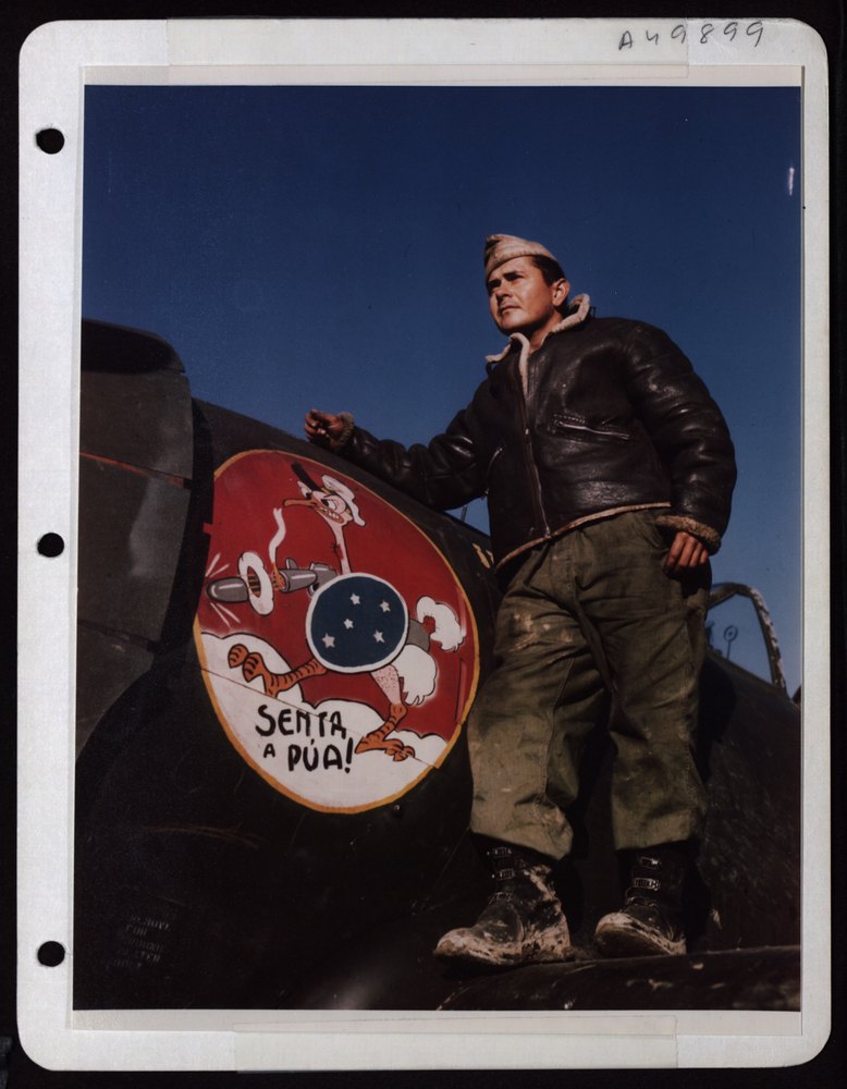 M/Sgt Robson Saldanha beside P-47