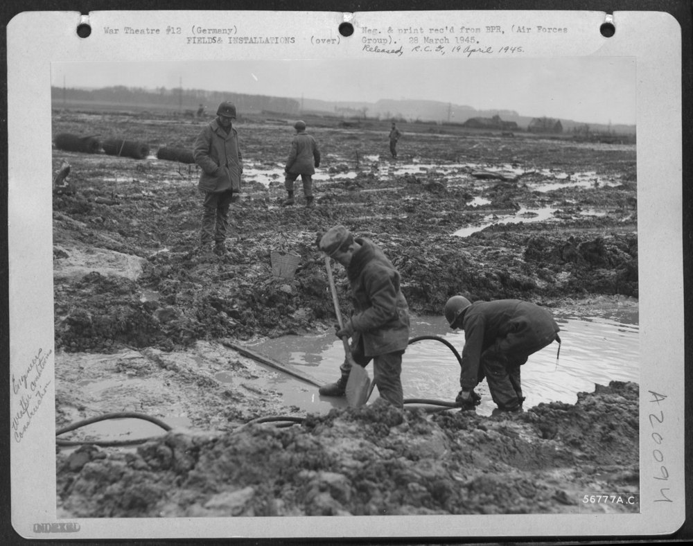 March 1945--Mud and water are a big hazard for men of the IX Engineer