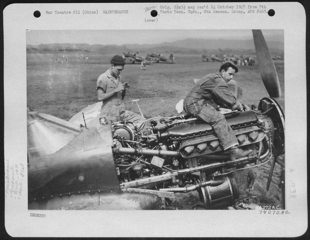 Mechanics work on fighter plane in China