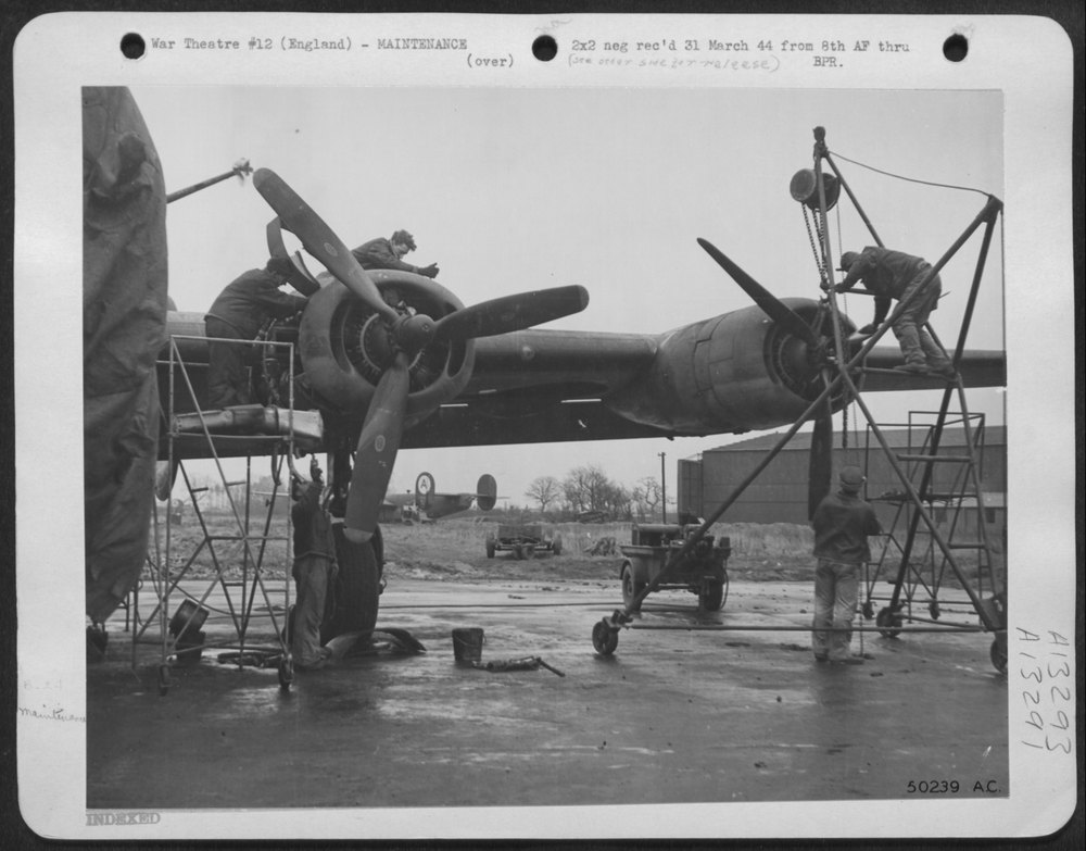 Mechanics work on Liberator in rain