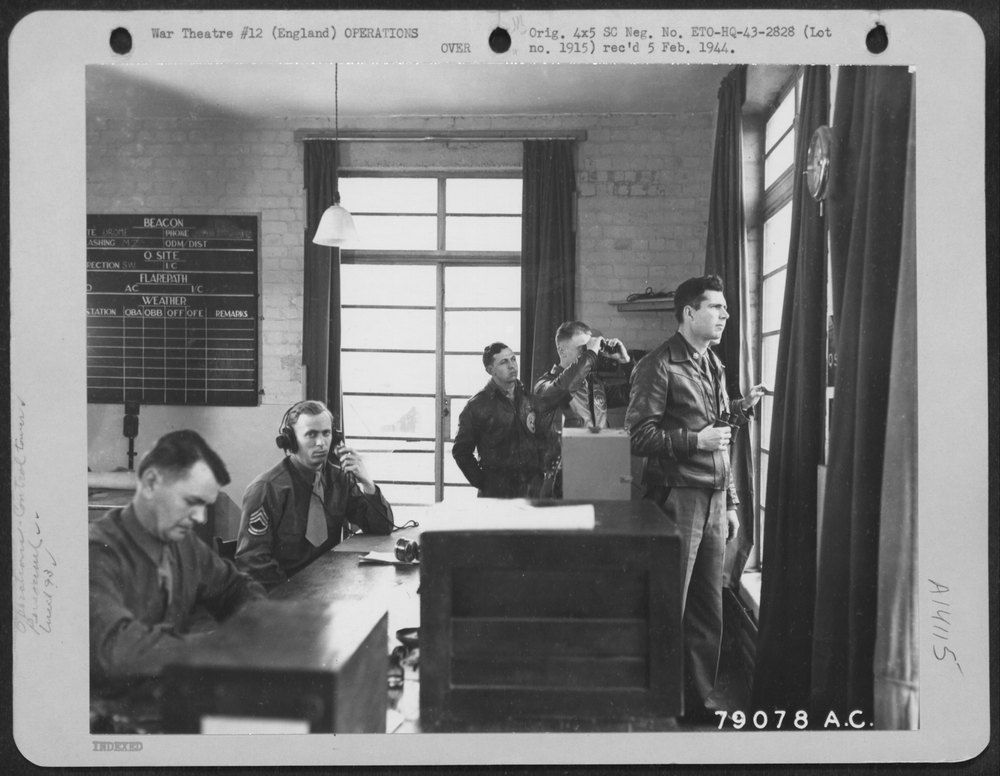 Men in control tower at U.S. bomber station