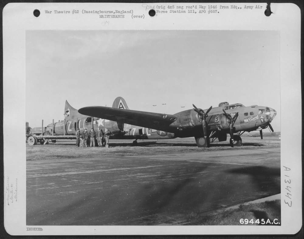Men Of The 91st Bomb Group Remove The Damaged Tail Of The Boeing