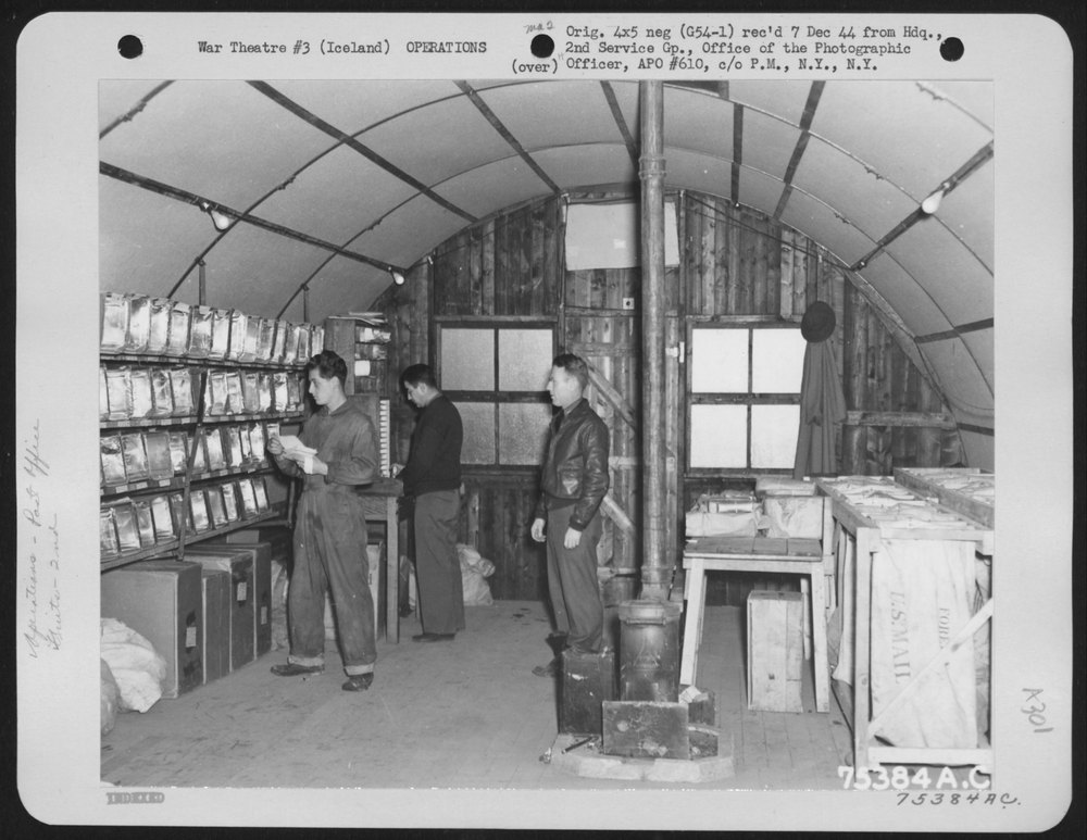 Men sort mail in Iceland