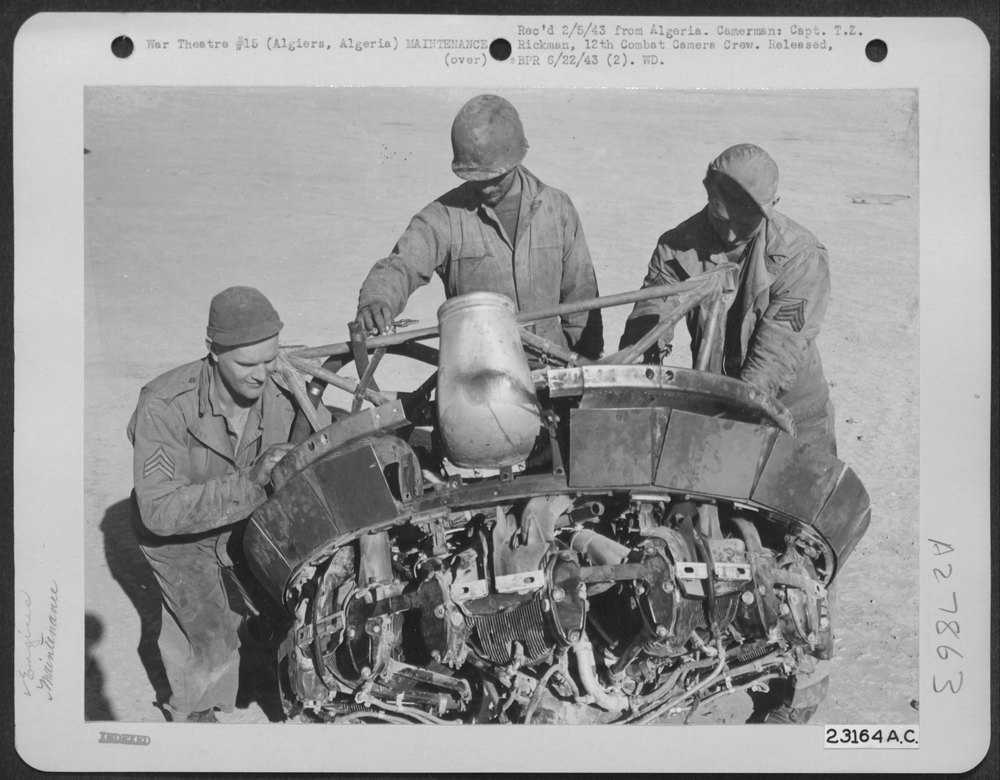 Men working on B-17 in Algiers