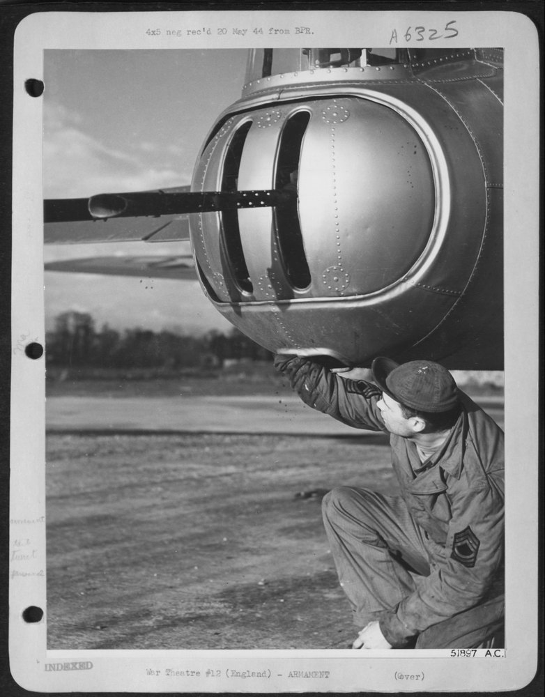NEW TAIL TURRET--Crew Chief M/Sgt. Wm. A. Lucas of Ashland, Wisc.