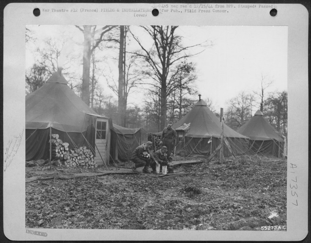 Ninth Air Force soldiers replenish fire wood