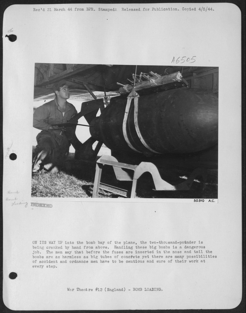 ON ITS WAY UP Into the Bomb Bay of the Plane