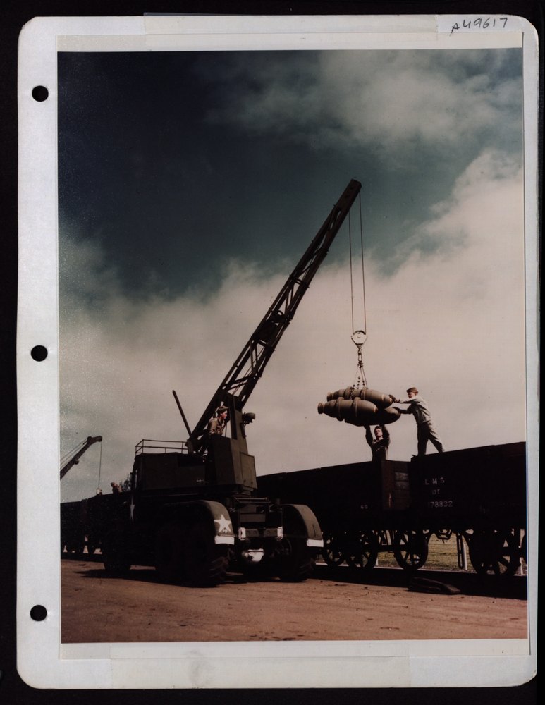 Ordnance Crew Unloading Bombs At 8th Af