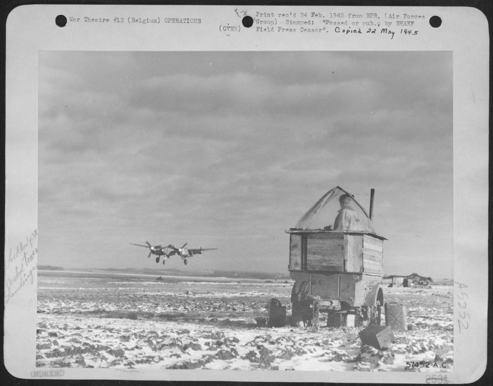 P-38 Fighter-Bomber Landing In Belgium