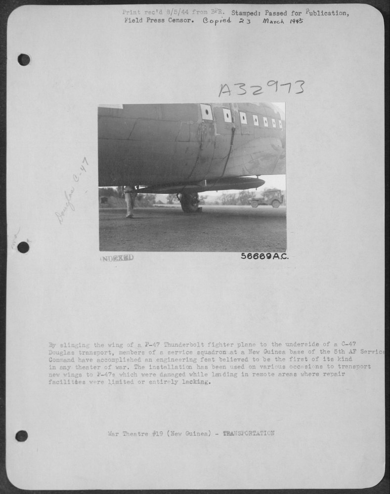 P-47 Thunderbolt under C-47 in New Guinea
