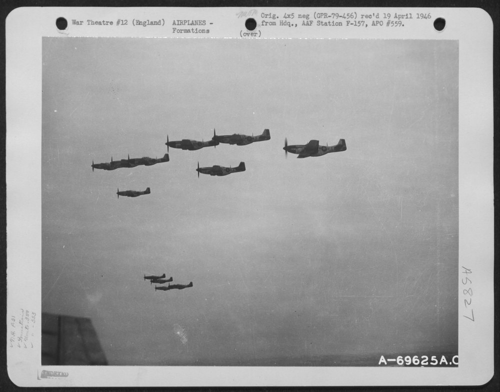 P51 Mustangs over English countryside