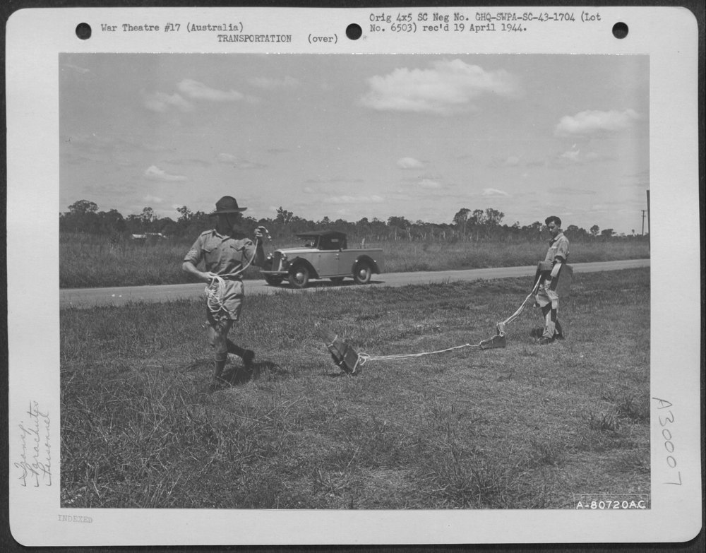 Paper Parachutes At Brisbane Airbase