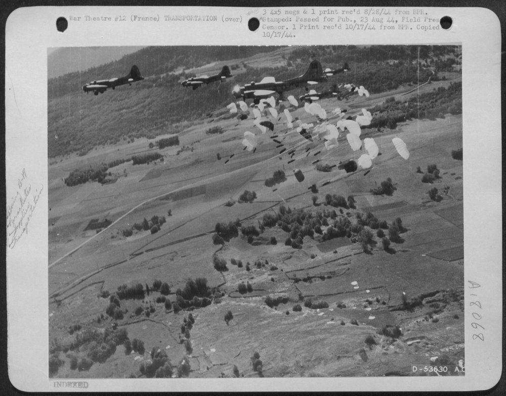 Parachutes over French countryside