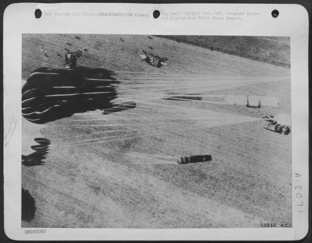 Parachutes over French countryside