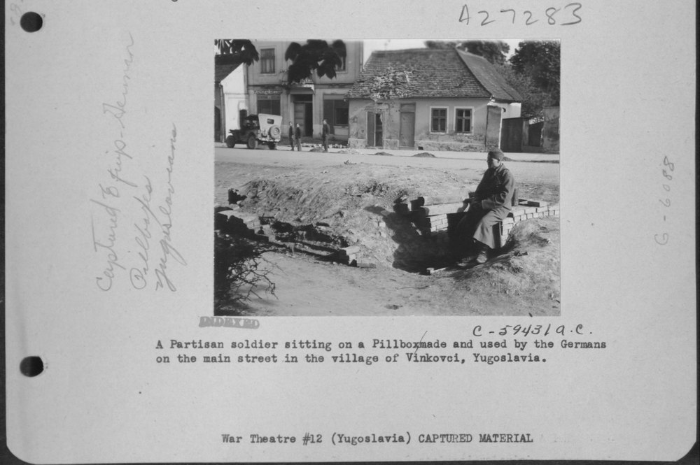 Partisan soldier on German pillbox in Vinkovci