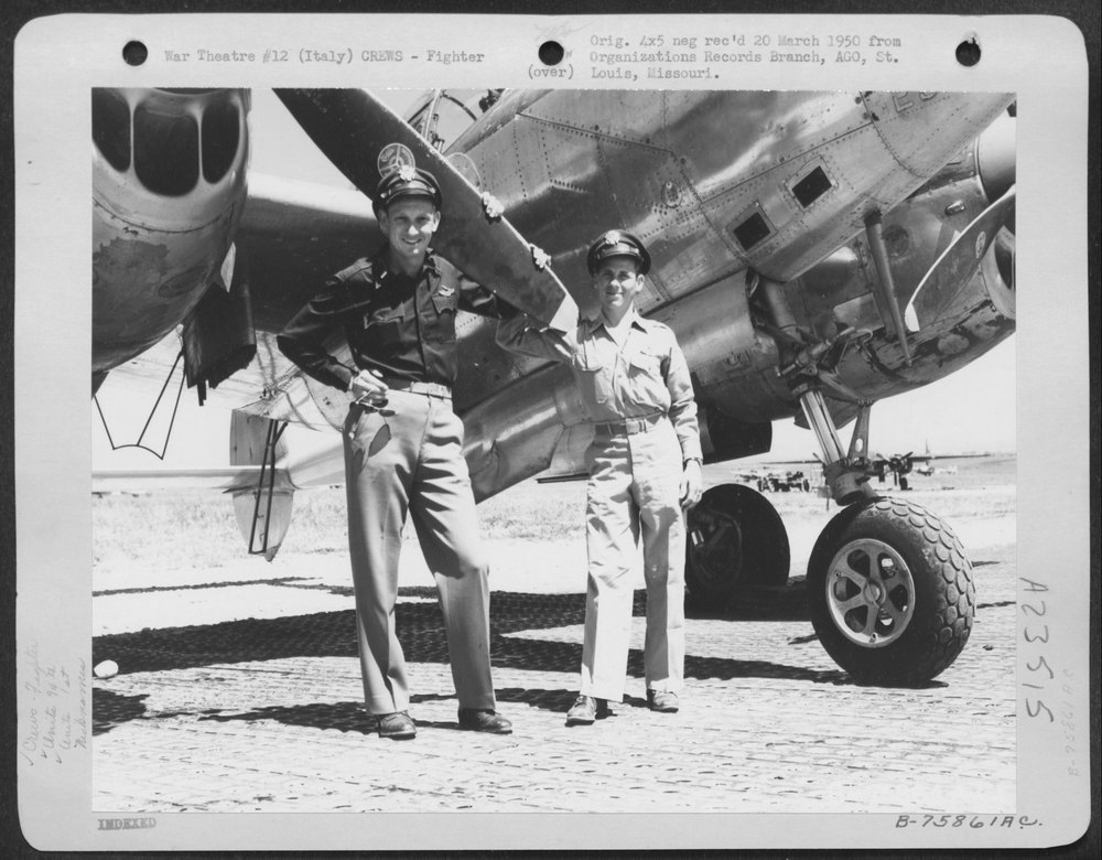 Pilots with P-38 in Italy