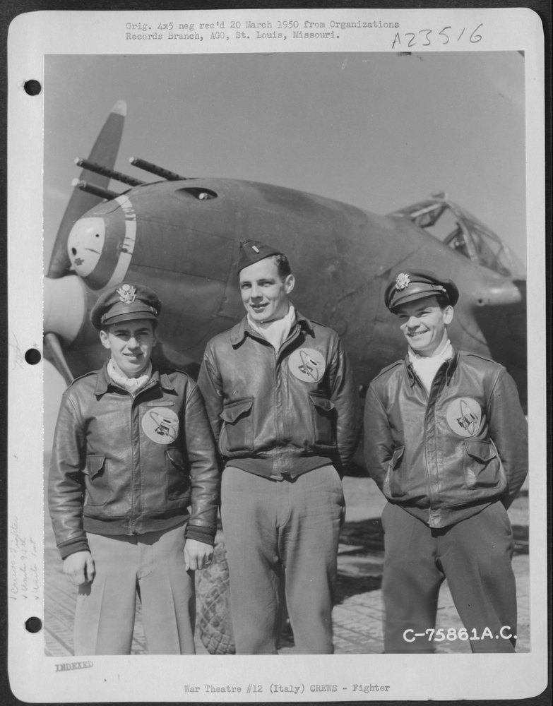 Pilots with P-38 in Italy