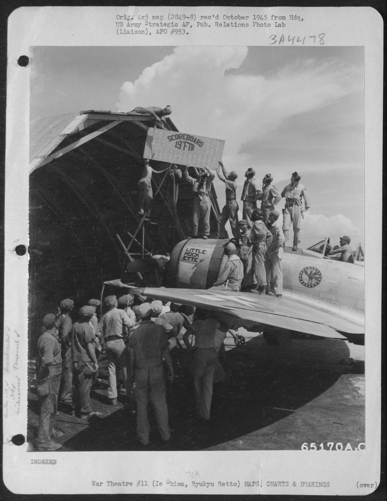 Pilots with P-47 Thunderbolt Little Rock Ette