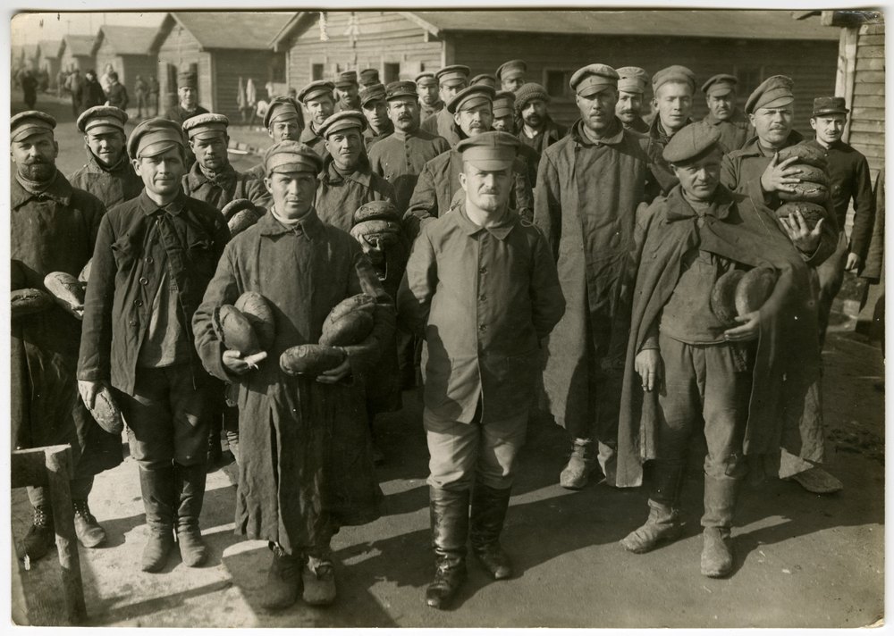 Prisoners of war receiving bread