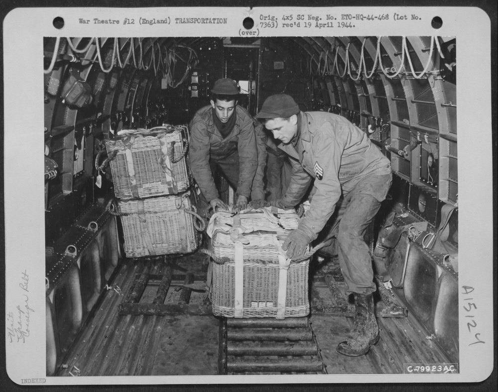 Qm troops of the 490th Qm Depot and the 101st Airborne Division try