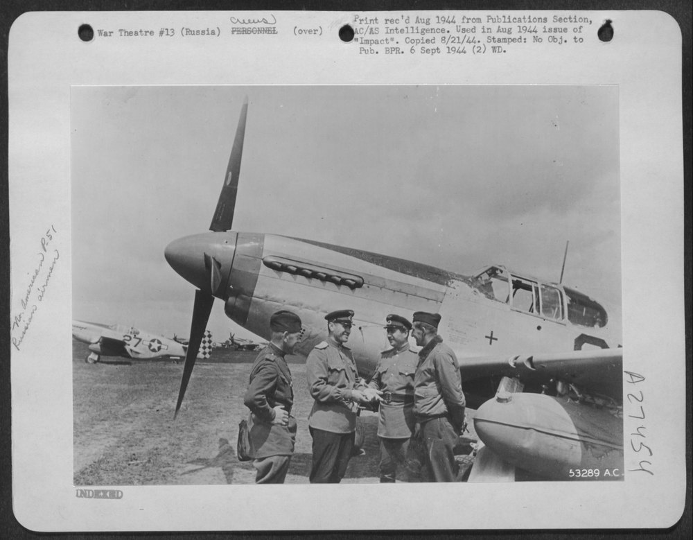 Red airmen and Mustang pilot in Russia