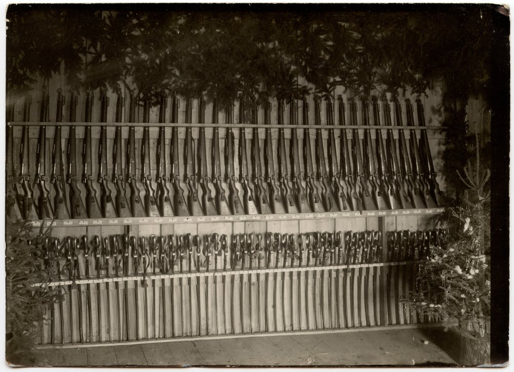 Rifles on a wooden rack