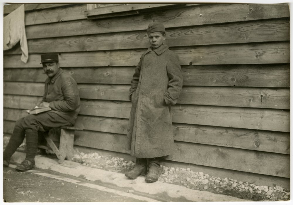 Russian boy prisoner with man