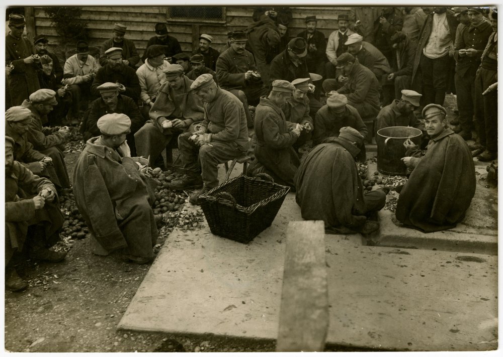 Russian prisoners of war peeling potatoes