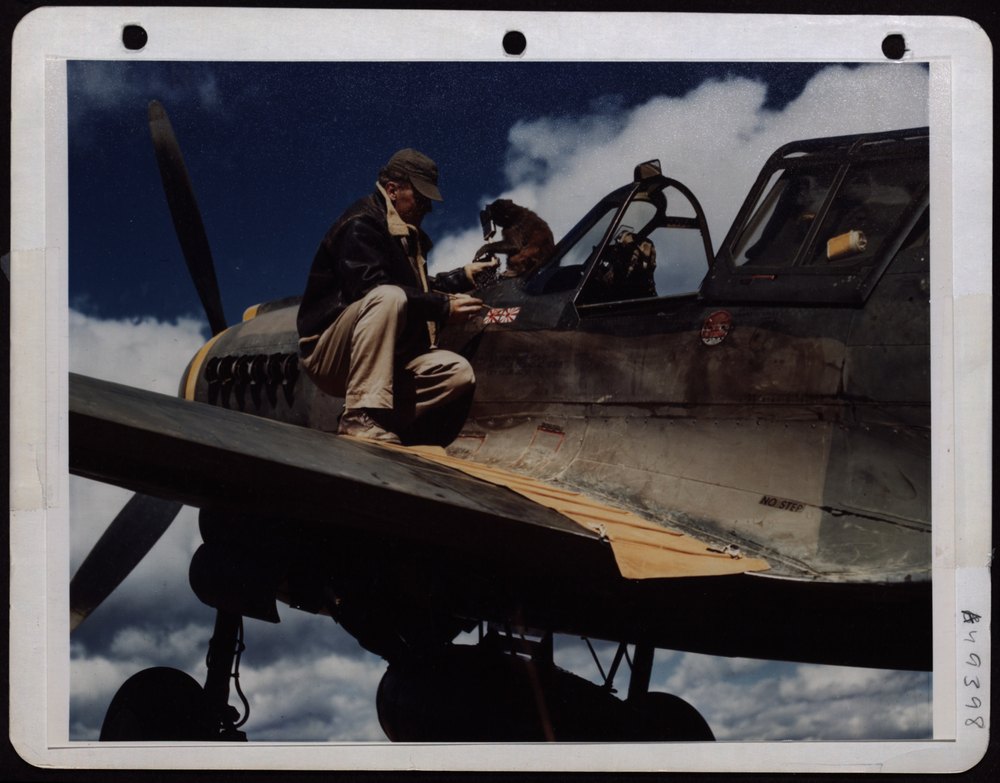 Sgt Elmer Pence with P-40 in China
