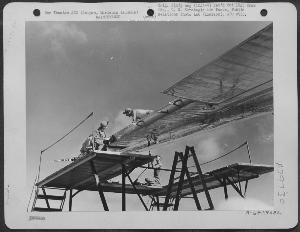 Sheet Metal Workers Repair Wing of a Boeing B-29 "Superfortress"
