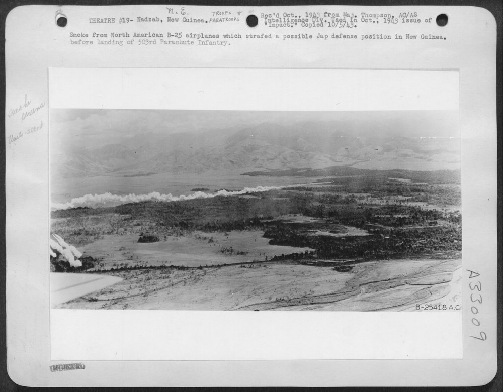 Smoke from North American B-25 airplanes which strafed a possible